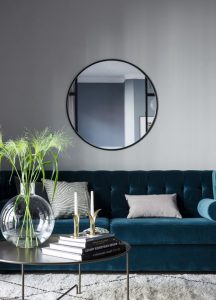 Decoración de salas con espejos redondos
